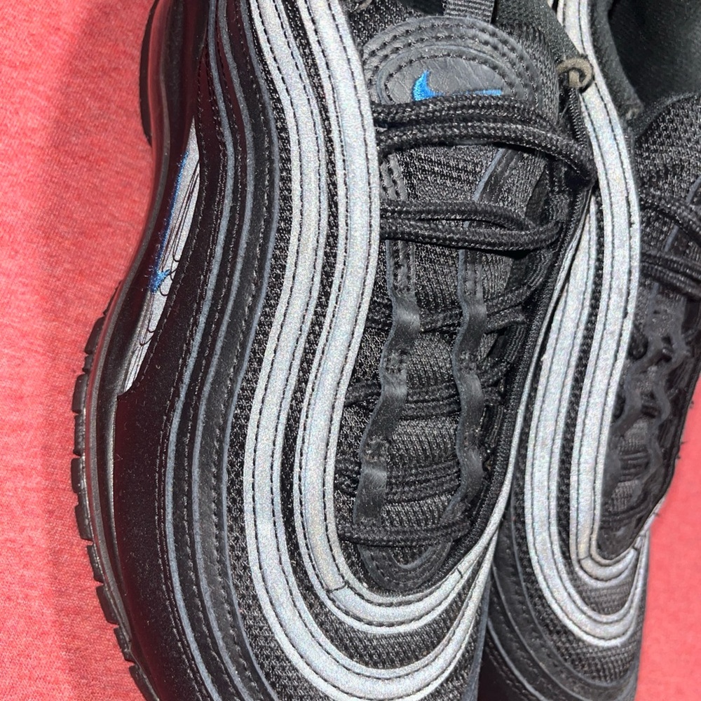 Nike Black and Gray Sneakers with Blue Accents